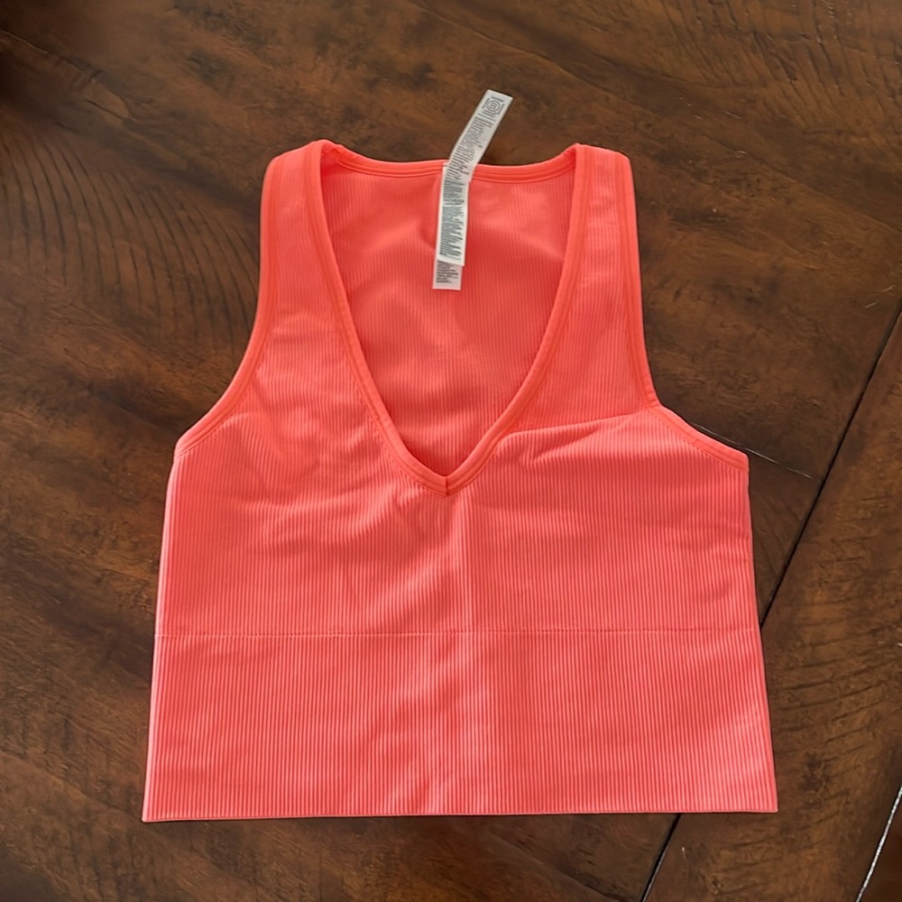 Neon orange Athleta workout shirt size extra small, never worn